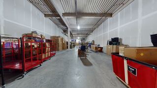 Warehouse space with red equipment