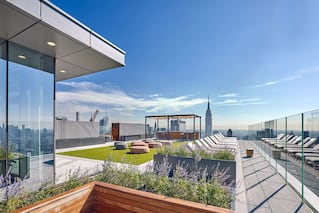 The Eugene rooftop deck with planters and greenspace