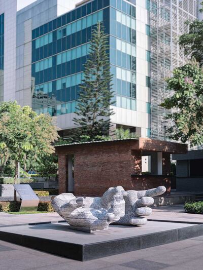 Office courtyard with sculpture of hands