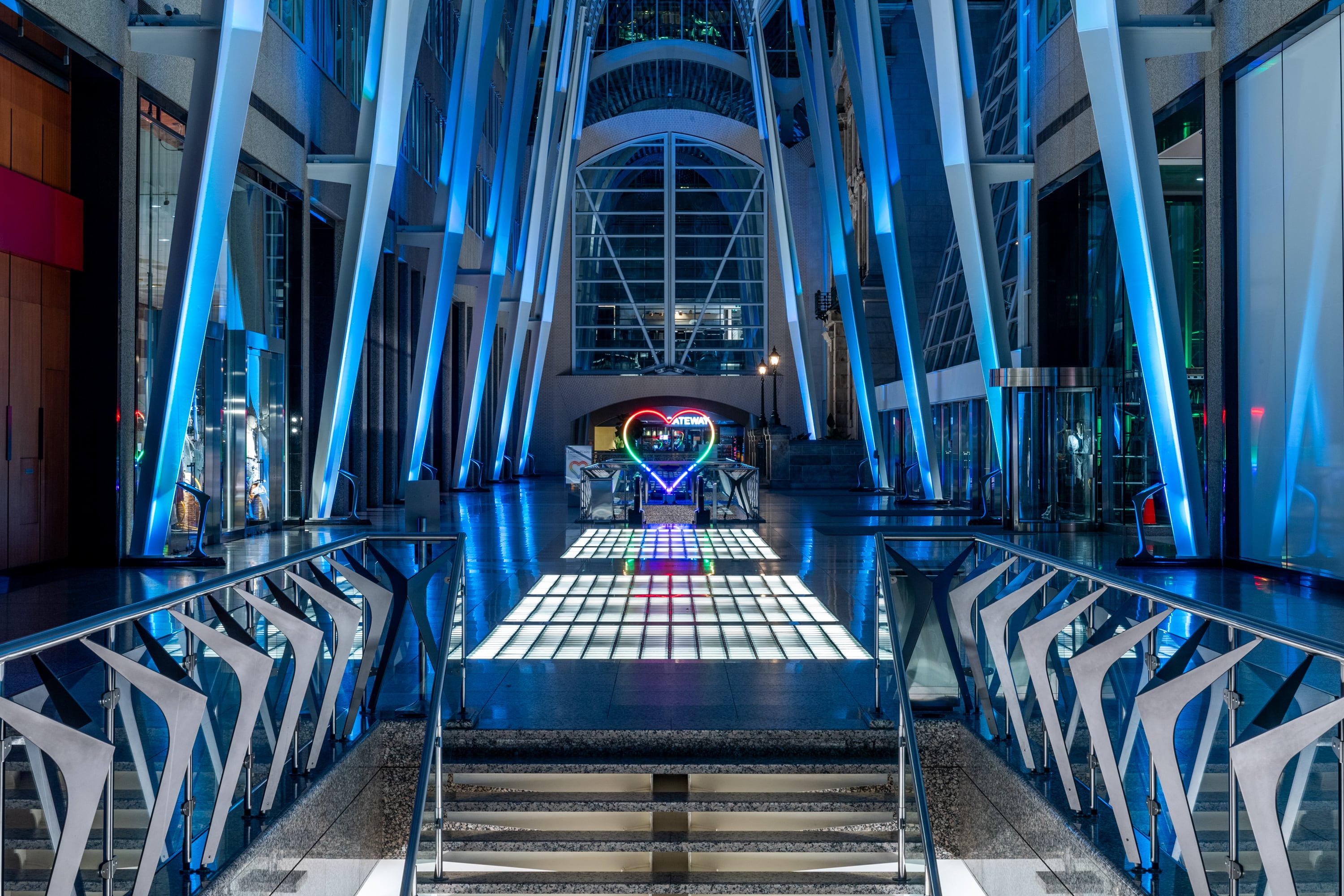 neon heart in building corridor