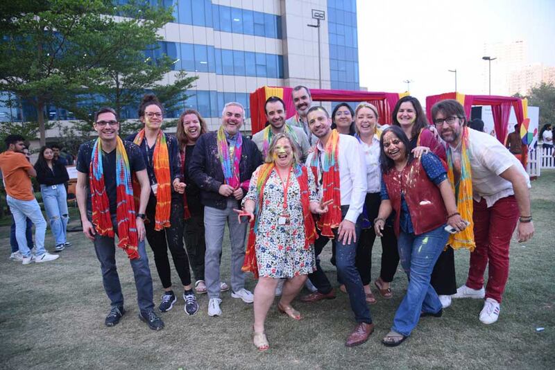group of people with colors