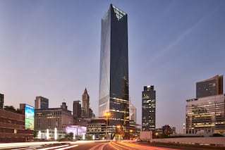 ICD Brookfield Place with other buildings in skyline at dusk