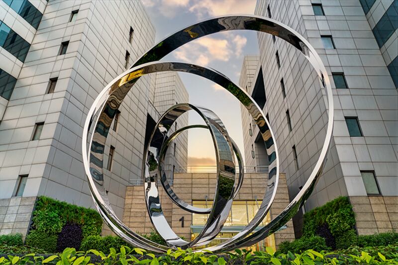 large metal sculpture outside offices