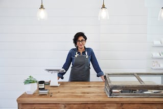 woman standing at counter