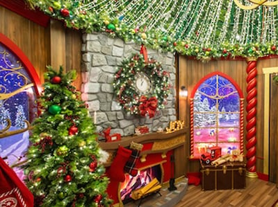 Holiday scene with fireplace and tree