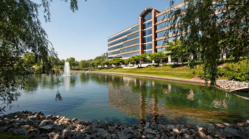 office building with lake