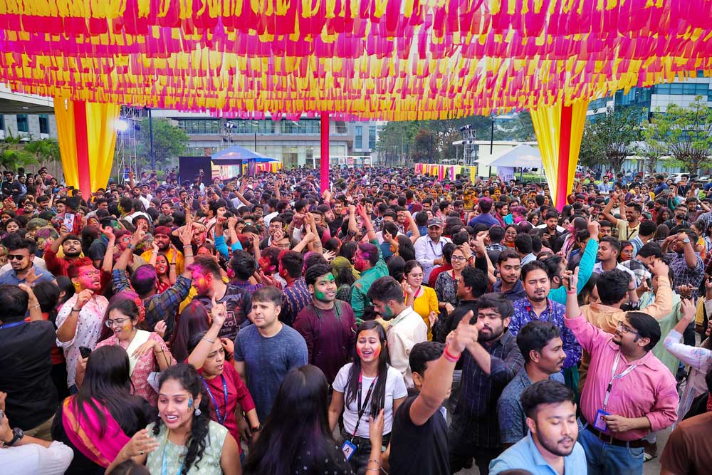 group of people under colorful tent