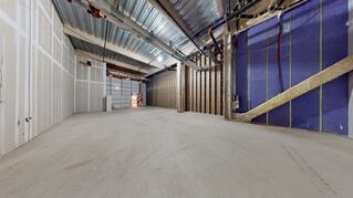 Warehouse space with blue wall