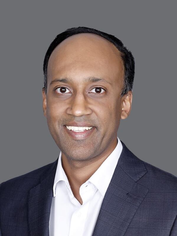 Male with a friendly smile wearing a sport coat