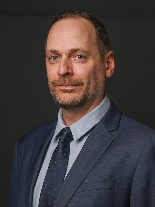 male dressed in a business suit