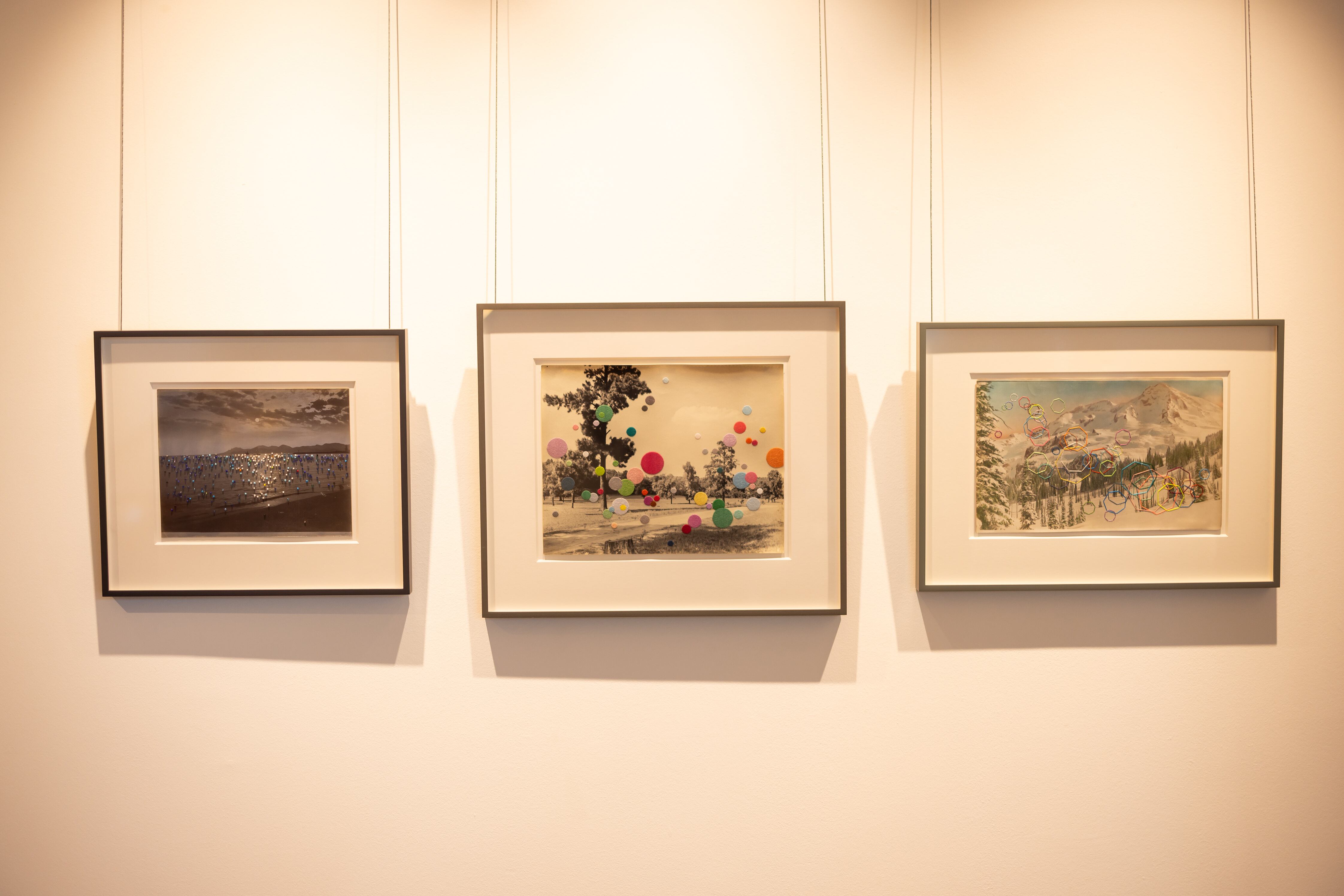 Julie Cockburn's colourful framed artworks in the reception area of Aldgate Tower.