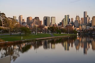 city skyline with body of water