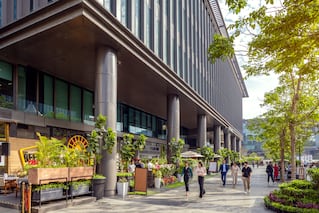 People walking in front of a building