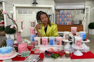 photo of candy connections founder with cotton candy product