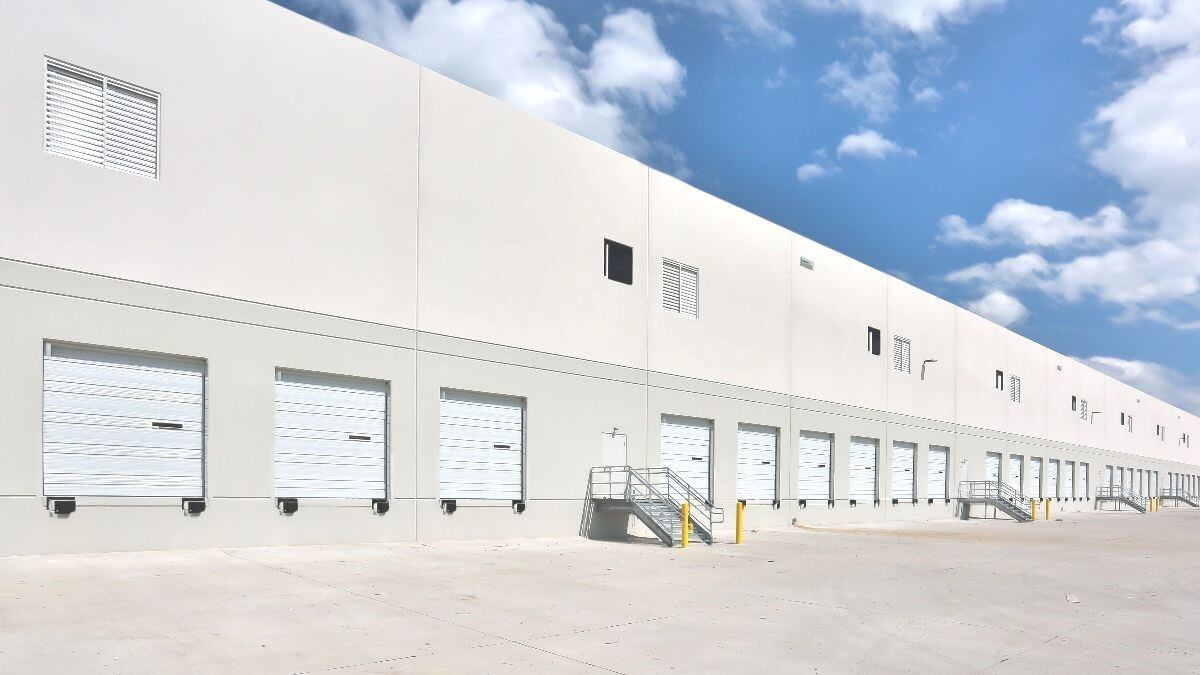 white logistics warehouse with docks