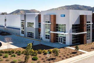 exterior of logistics building from the corner and new landscaping out in front